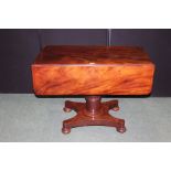 Victorian mahogany breakfast table, with two drop leaves and frieze drawer, on turned stem, raised