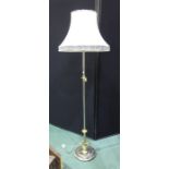 Copper and brass effect standard lamp with white shade