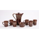 1960's coffee set, the brown ground with mottled decoration, consisting of coffee pot, sugar bowl