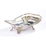 Plate on brass fruit basket, with shaped swing handle, the body with embossed fruit stylised leaf