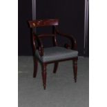 Victorian mahogany elbow chair, with curved cresting rail and splat back, scrolled arms, over