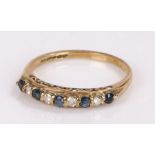 9 carat gold sapphire set ring, ring size O 1/2