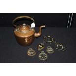 Copper kettle, together with a selection of horse brasses and brass camel, (qty)