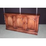 Georgian style English oak sideboard, with three panelled cupboard doors, on a plinth base, 160cm