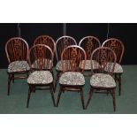 Set of eight 19th Century style Windsor wheelback dining chairs, with spindle and wheel carved splat