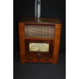 Radio housed with in a wooden case, with internal speaker,