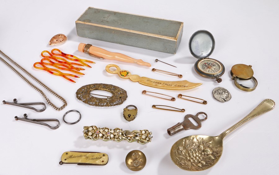Collection of objects, to include chains, a compass, bracelet, spoon, buckle, etc, (qty)
