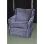 Blue upholstered armchair, on casters