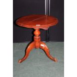 Victorian style mahogany occasional table, with circular tilt top, on turned stem and tripod legs,