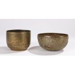 Two 19th Century Indian brass bowls, the first decorated with tigers hunting among foliate