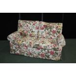 Bed-settee, upholstered in a floral decorated material