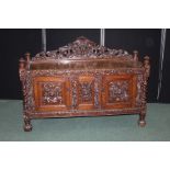 Victorian oak sideboard, the scrolled pierced upstand with animal mask centre, carved crown form