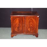 Mahogany veneered cupboard, with two simulated panelled cupboard doors opening to reveal an interior