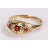 9 carat gold garnet set ring, with three garnets to the head, ring size P 1/2