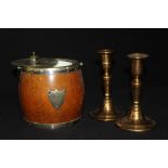 Early 20th Century oak and late mounted biscuit barrel and cover, two brass candlesticks (3)