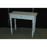 Turquoise painted pine side table, with small frieze drawer, on turned legs, 89cm wide