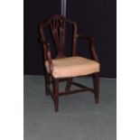 Georgian style mahogany elbow chair, with pierced splat back, curved arm supports, overstuffed seat,