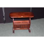 Old Charm oak occasional table/ canterbury, the top with rounded ends above a line fold panelled