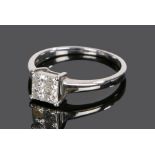 18 carat white gold and diamond set ring, the head set with four princess cut diamonds, ring size M