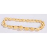 19th Century ivory necklace, with tapering beads