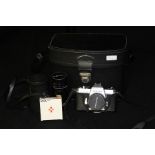 Pentax Sportmatic camera together with a case containing spare lenses and accessories (qty)