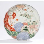 Japanese Meiji period porcelain dish, decorated with two storks and an Imari design swirl, mark to