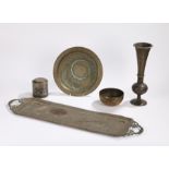 Indian metal ware, to include a long foliate decorated tray, a tall vase, a cannister and lid, a