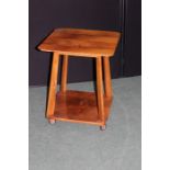 Mid 20th Century walnut veneered occasional table, the square top with canted corners, on shaped