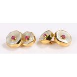 Pair of mother of pearl and ruby gilt cufflinks, of octagonal form