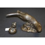Works of art, to include a model of an otter, 31cm long, together with a mouse model, 10.5cm high