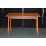 Mid 20th Century dining table, the melamine top on square legs, 129.5cm x 76.5cm