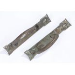 Pair of Glasgow school copper door handles, with loop handles on shaped back plates, 30cm x 5cm