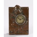 Edwardian novelty desk clock, the embossed copper mount depicting a rotund policeman holding a