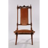 Victorian folding nursing chair, with turned finials flanking the pierced cresting rail, upholstered