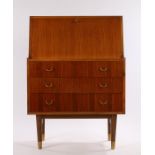 G-plan style veneered bureau, the fall flap opening to reveal four small interior drawers, the