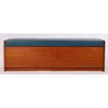 G-plan style hall seat/ ottoman, the blue leatherette upholstered hinged seat opening to reveal a