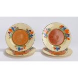 Four Clarice Cliff Bizarre Crocus Newport Pottery saucer dishes, printed marks to base and impressed