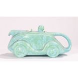 Sadler Art Deco ceramic novelty teapot modelled as a racing car and driver in mottled turquoise