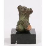 Cast bronze human torso, on a polished black marble base, 11cm high