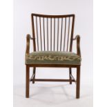 Beech armchair, with curved cresting rail, chamfered pierced comb style splat back, shaped arms,