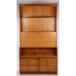 Nathan teak bookcase, with curved pediment above a single shelf and fall panel opening to reveal a