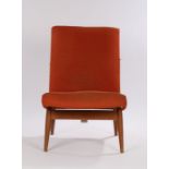 Parker Knoll easy chair, model no. P.K.945/7 mk2, with rust coloured upholstery, on turned legs