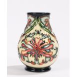 Moorcroft Florian Dream pattern vase, the tapering bulbous body with foliate decoration, incised and
