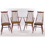 Pair of Ercol carver chairs, with turned spindle backs, solid dished seats, on splayed tapering