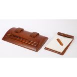 Art Deco brown bakelite inkwell/desk stand, the two inkwells with sliding covers, matching notepad