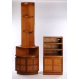 Nathan teak stereo cabinet, with three open recesses above a quadruple panelled cupboard door,
