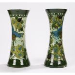 Pair of Baron Barnstaple pottery vases, the waisted bodies with foliate and bird decoration, incised