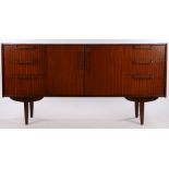 Mid 20th Century mahogany veneered sideboard with two cupboard doors flanked by three drawers to