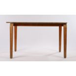 Mid 20th Century occasional table, with red melamine top, on curved plywood legs, 101cm x 50cm