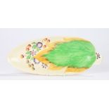 Clarice Cliff Newport pottery leaf shaped dish, decorated with a leaf, fruit and flowers, printed